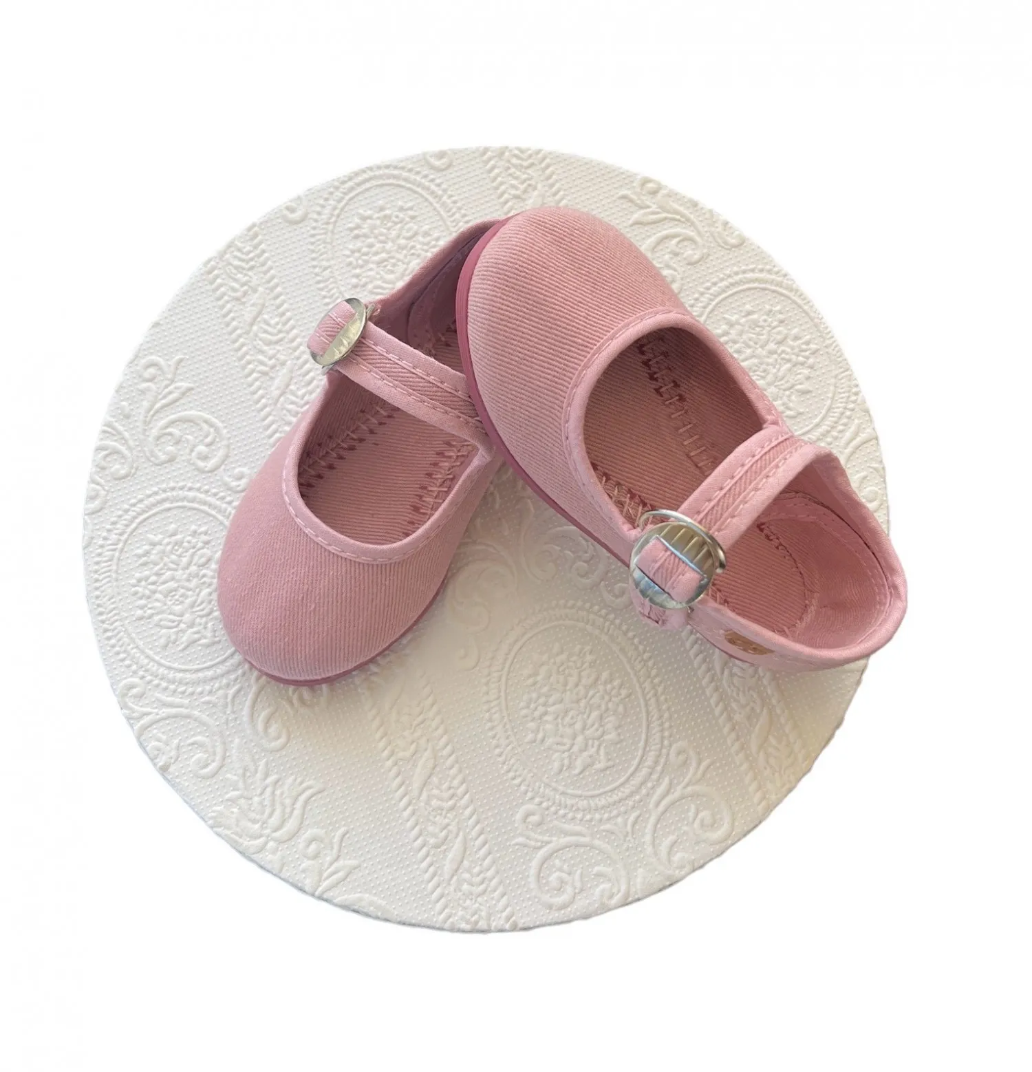 Mercedita sneaker in pale pink canvas.