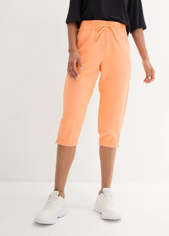 Pantalón funcional de largo capri y secado rápido Naranja claro