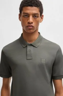 Polo slim fit de algodón elástico con parche de logo